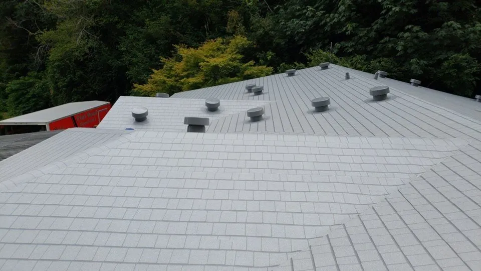 Slide of Rich Rayburn Roofing