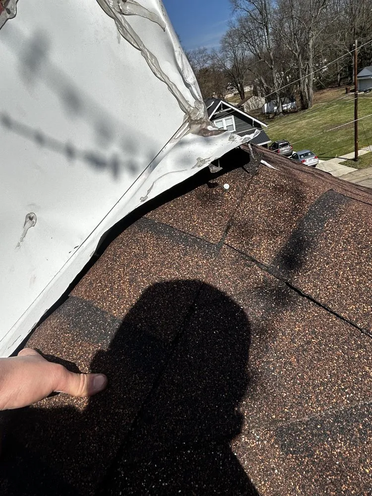 Slide of Rich Roofing