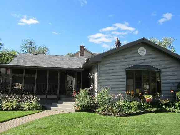 Slide of Rich's Roofing