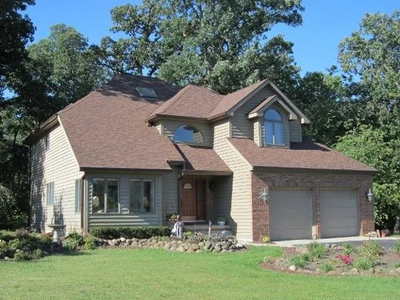 Slide of Rich's Roofing