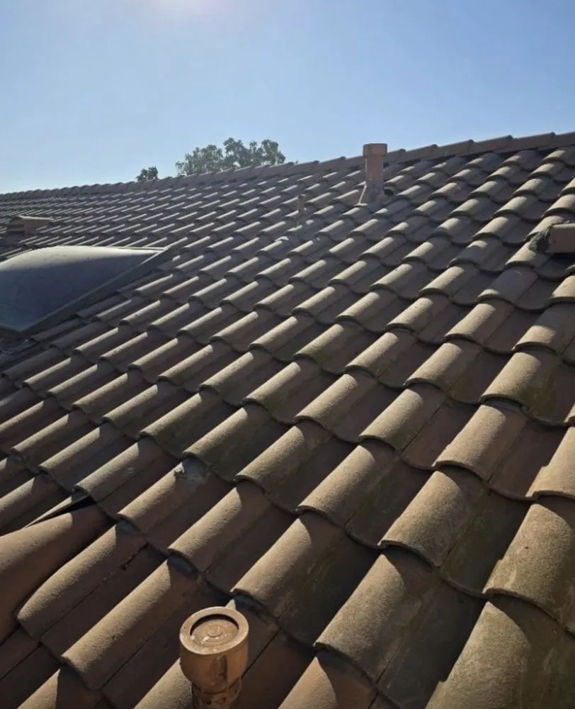 Slide of Richy’s Roofing Repair