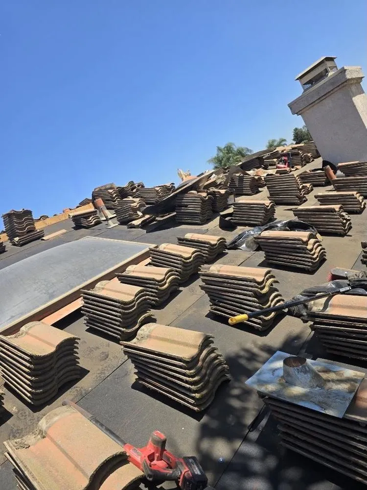 Slide of Richy’s Roofing Repair