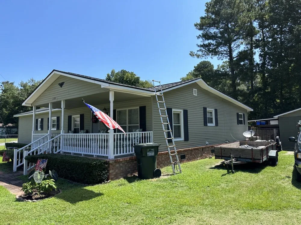 Slide of Rick Ross Exteriors and Roofing