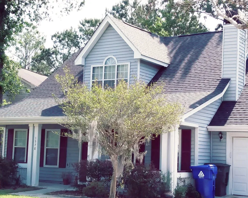 Slide of Rick Ross Exteriors and Roofing