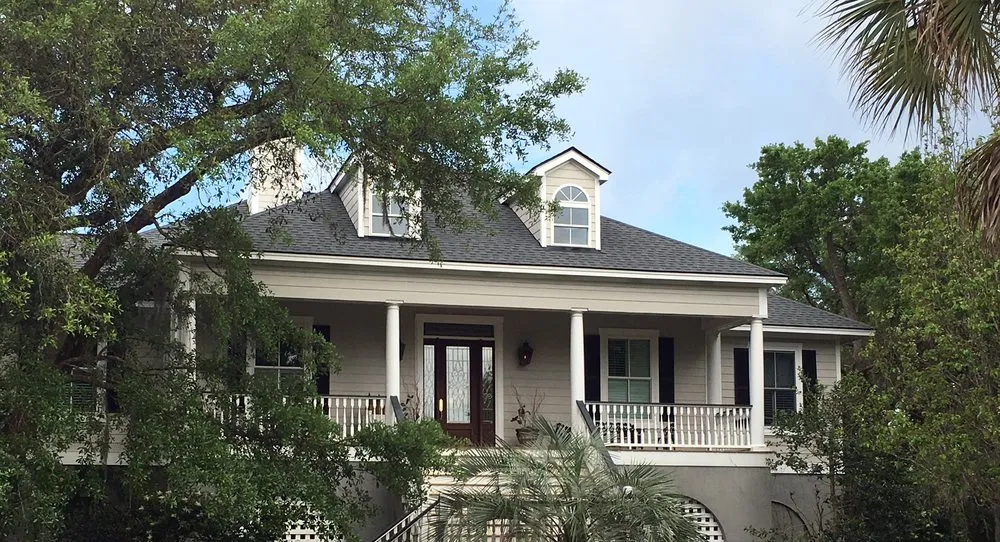 Slide of Rick Ross Exteriors and Roofing