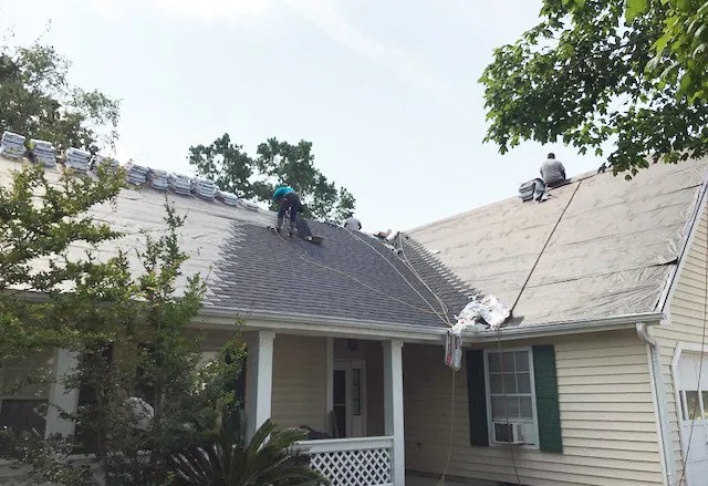 Slide of Rick Ross Exteriors and Roofing