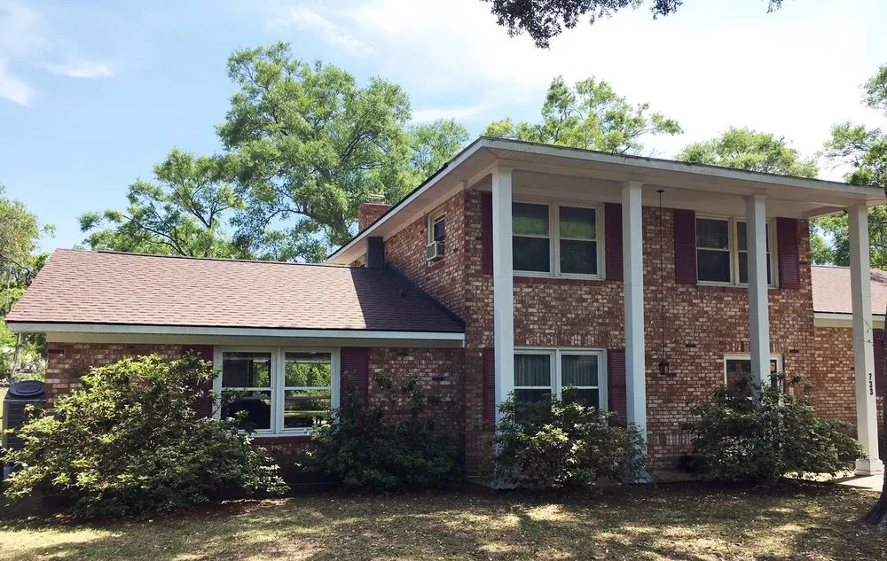 Slide of Rick Ross Exteriors and Roofing