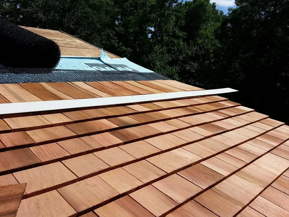 Slide of Rick's Main Roofing Ltd