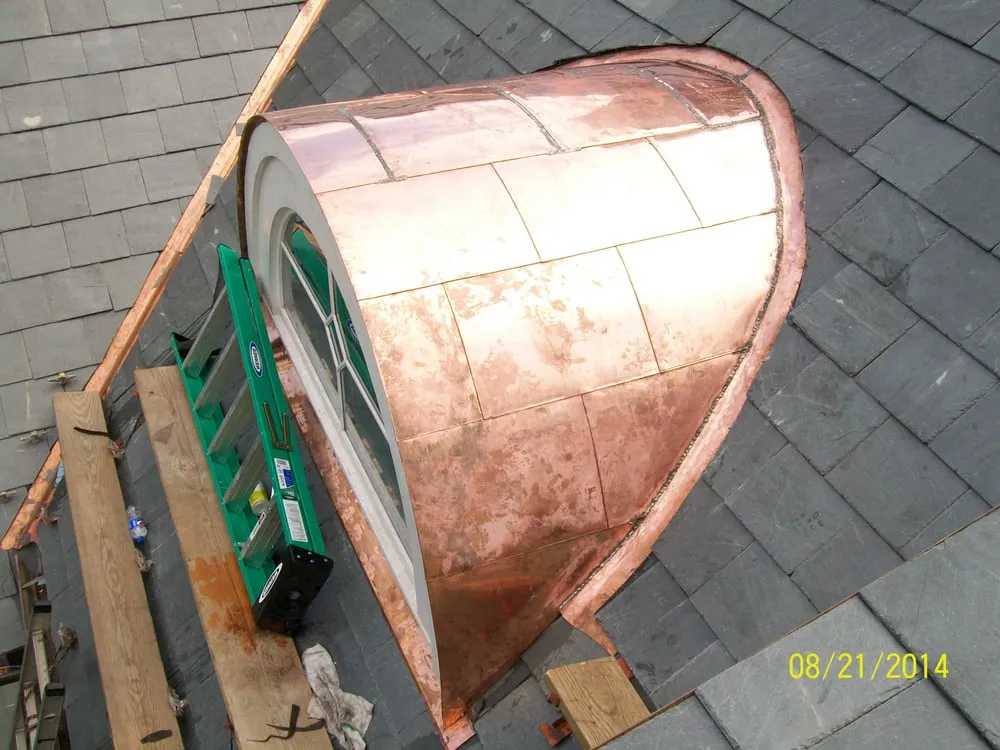 Slide of Rick's Main Roofing Ltd