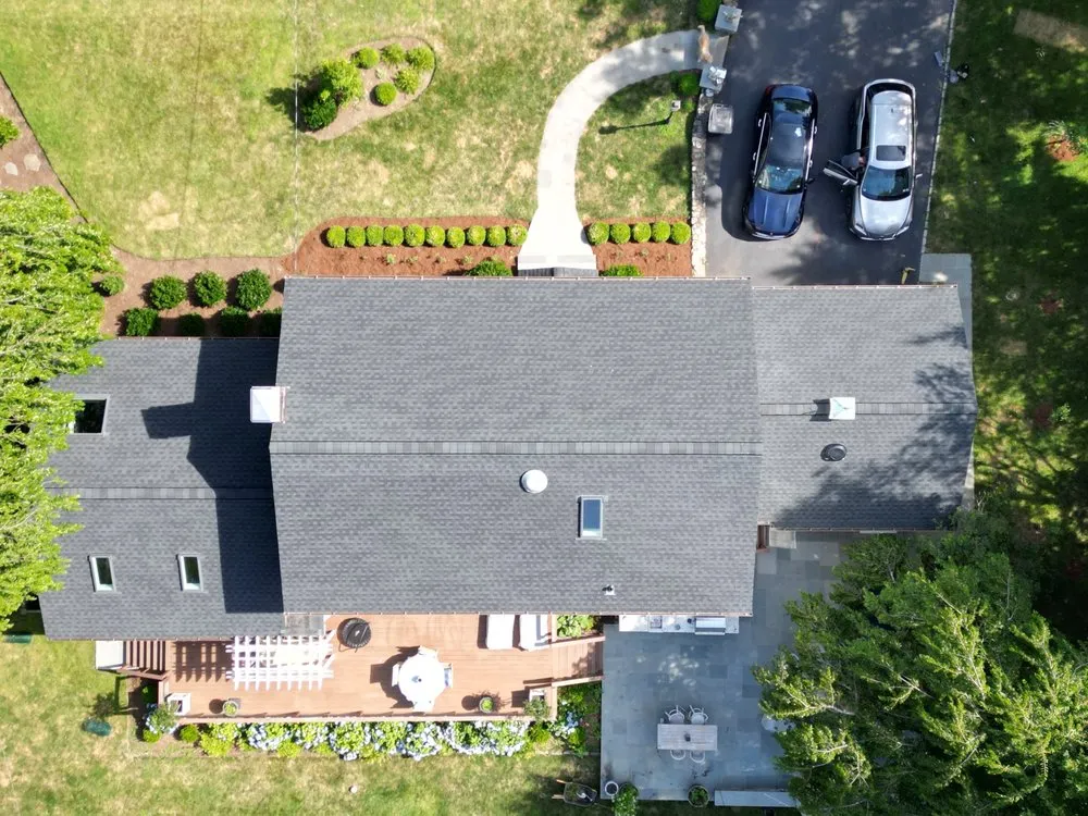 Slide of Rick's Main Roofing Ltd