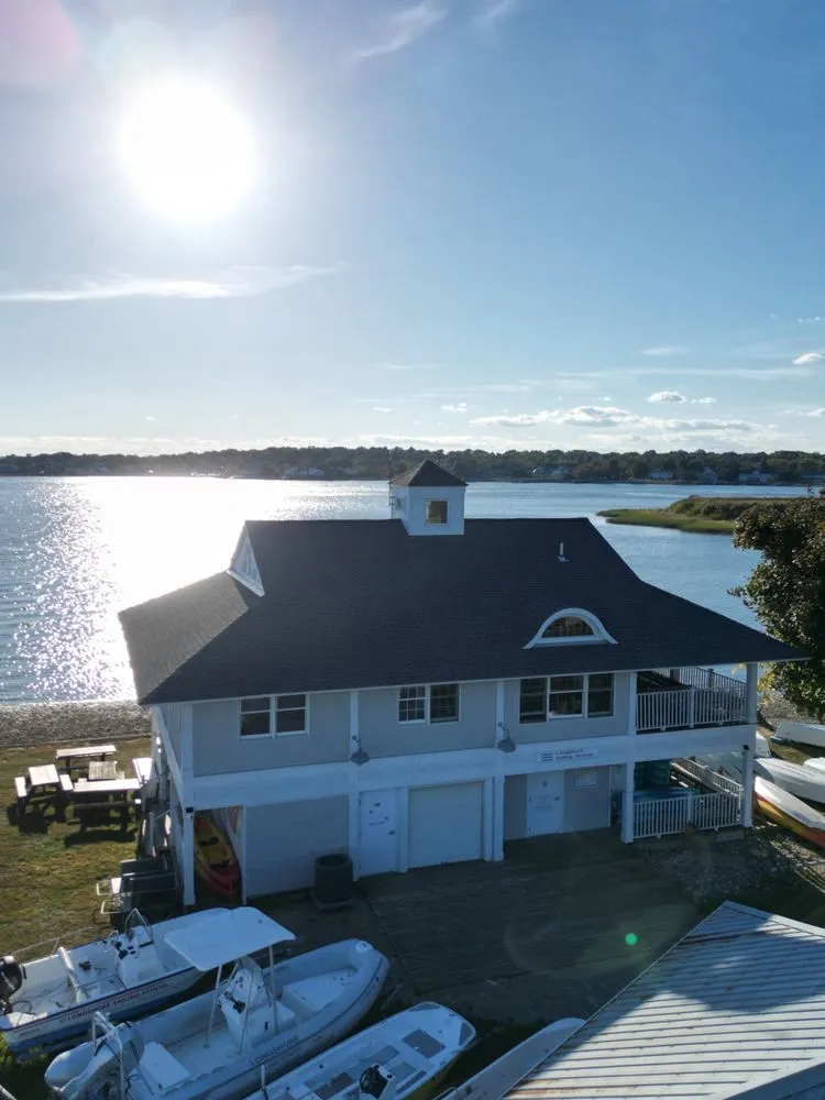 Slide of Rick's Main Roofing Ltd