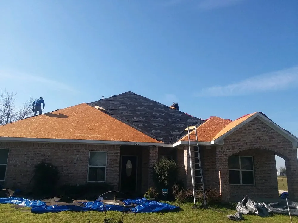 Slide of Rick's Roofing & Construction