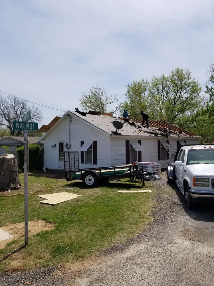 Slide of Rick's Roofing & Construction