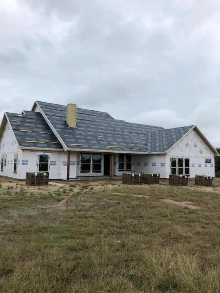 Slide of Rick's Roofing & Construction