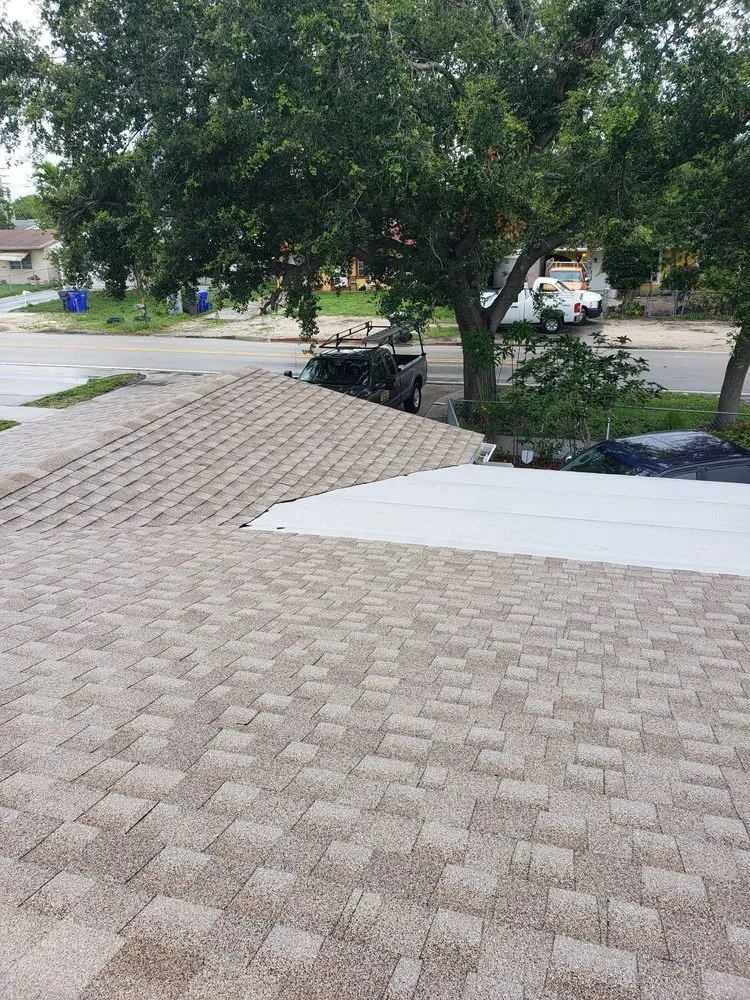 Slide of Rick's Roofing and Repairs