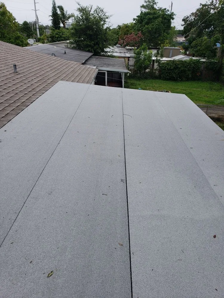 Slide of Rick's Roofing and Repairs