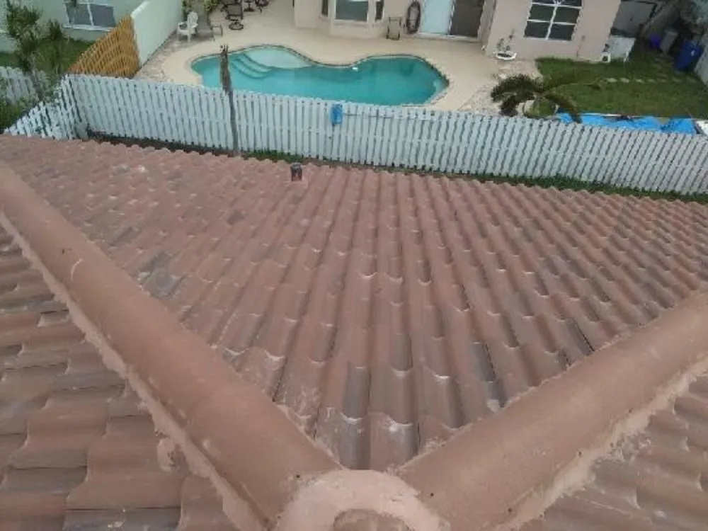 Slide of Rick's Roofing and Repairs