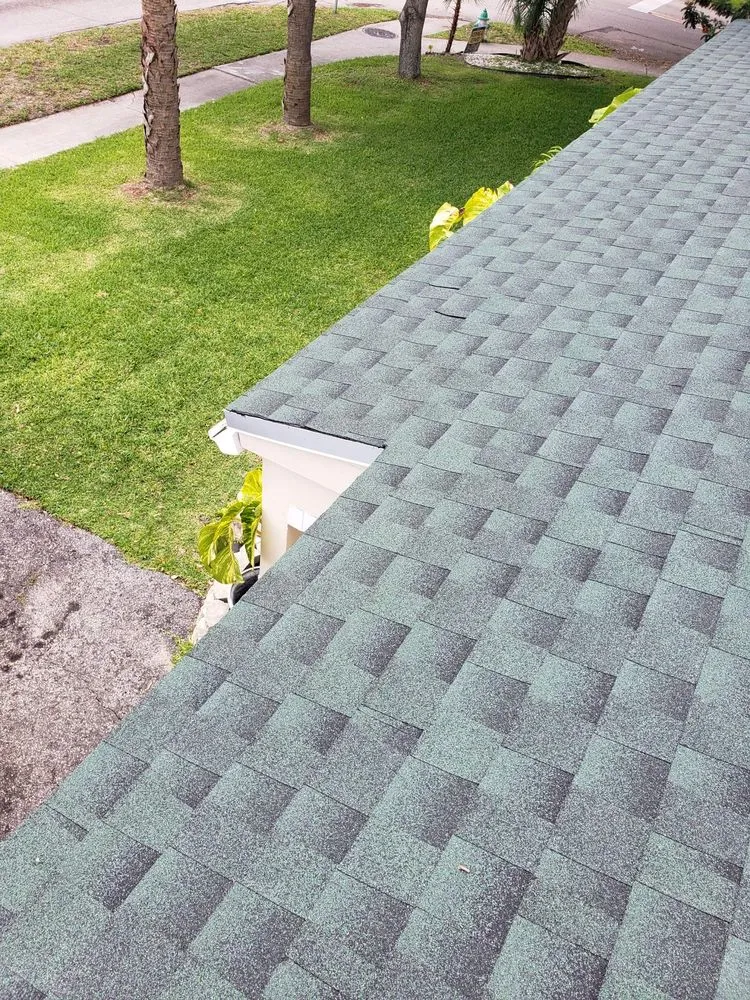 Slide of Rick's Roofing and Repairs