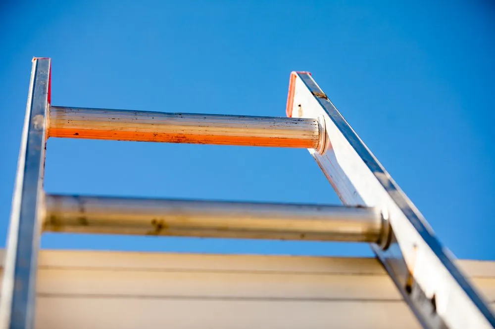 Slide of Rick's Roofing Company