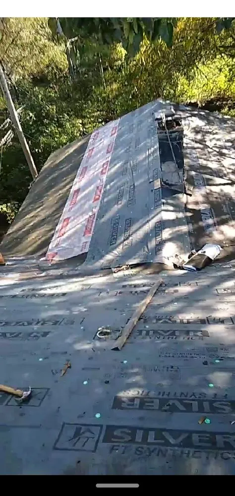 Slide of Ricks Roofing