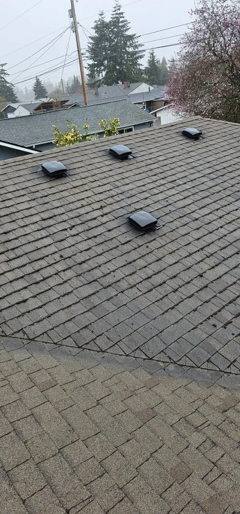 Slide of Ricky Bobby's Roofing Services