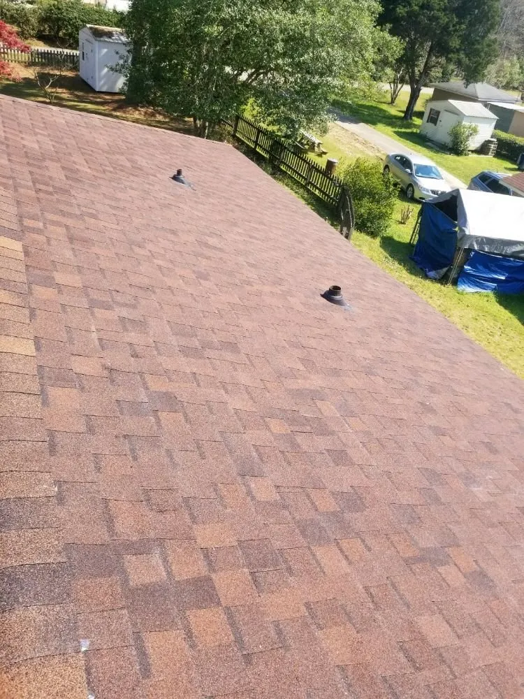 Slide of Ricky Smith Roofing