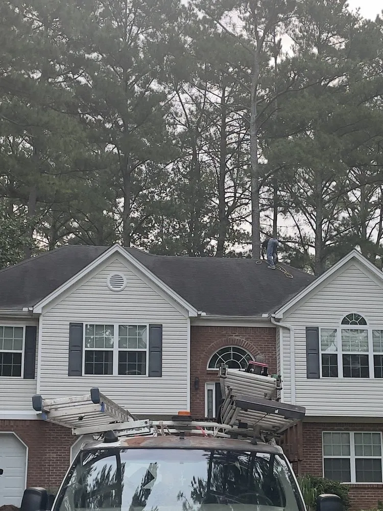 Slide of Ricky's Roofing