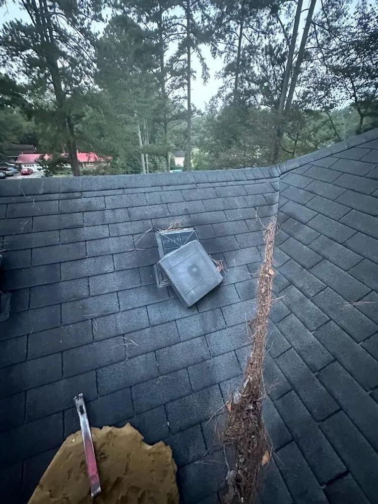 Slide of Ricky's Roofing