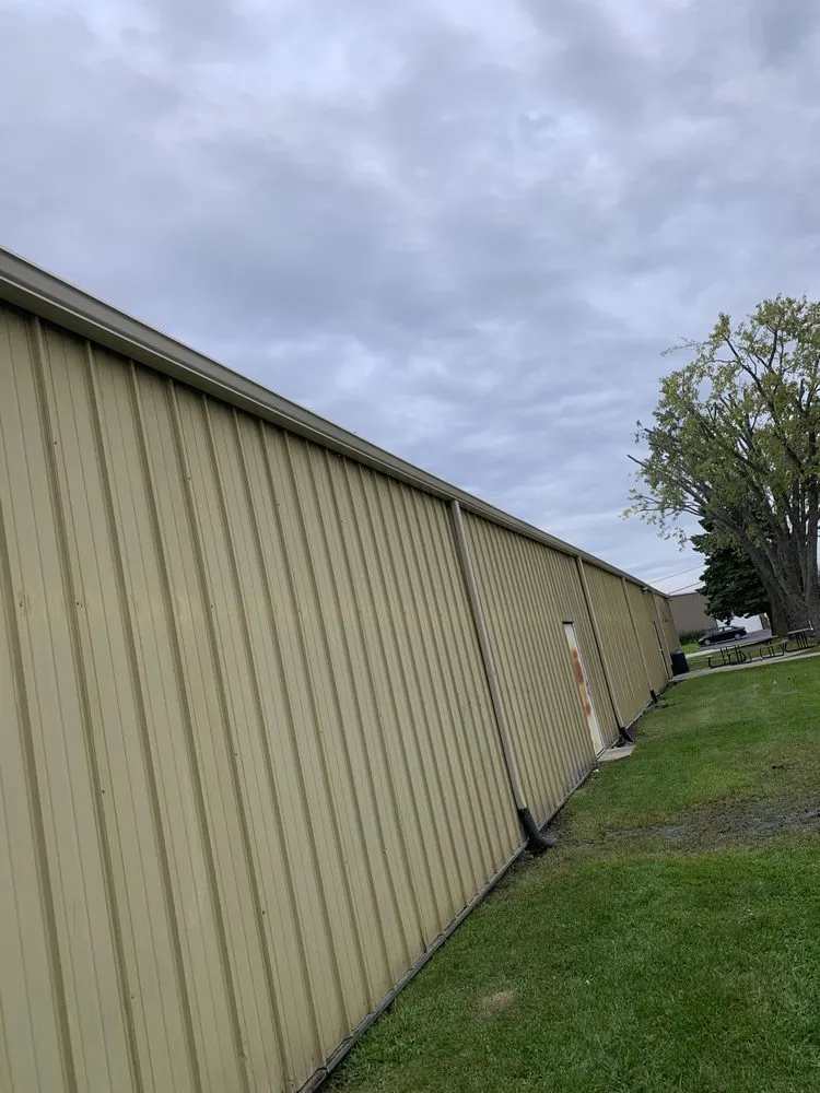 Slide of Rico’s Roofing & Siding