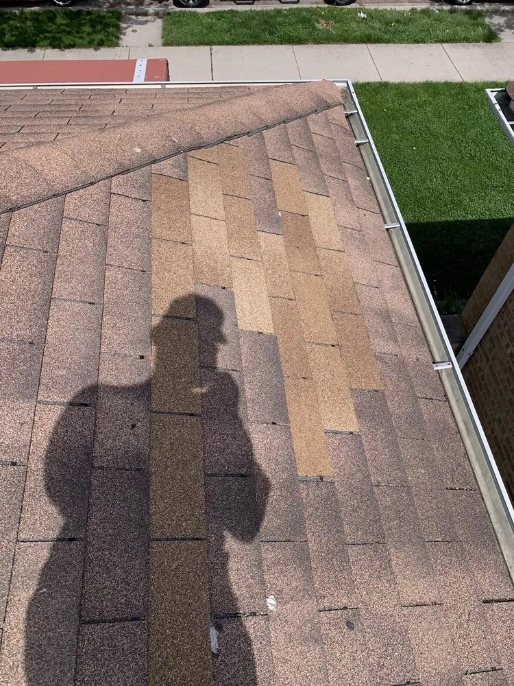 Slide of Rico’s Roofing & Siding