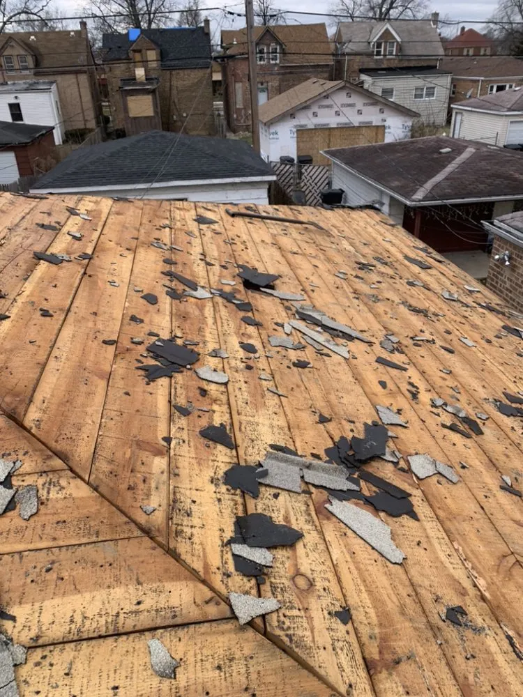 Slide of Rico’s Roofing & Siding