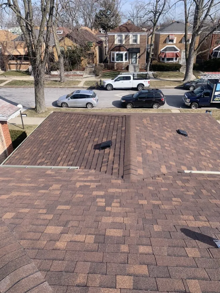 Slide of Rico’s Roofing & Siding