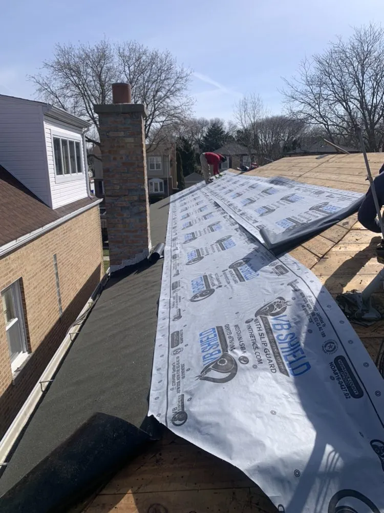 Slide of Rico’s Roofing & Siding