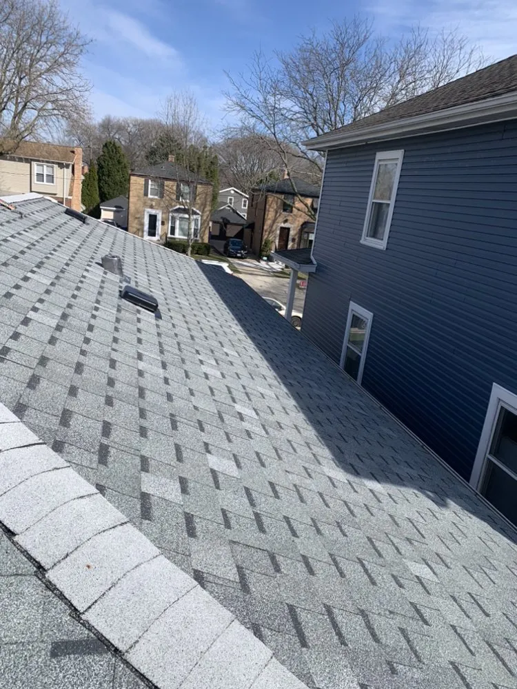 Slide of Rico’s Roofing & Siding