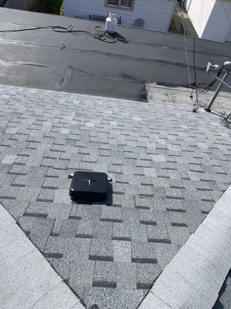 Slide of Rico’s Roofing & Siding