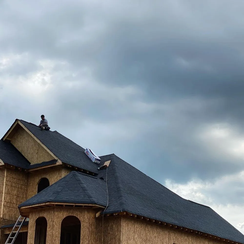 Slide of Rico’s Roofing Restorations