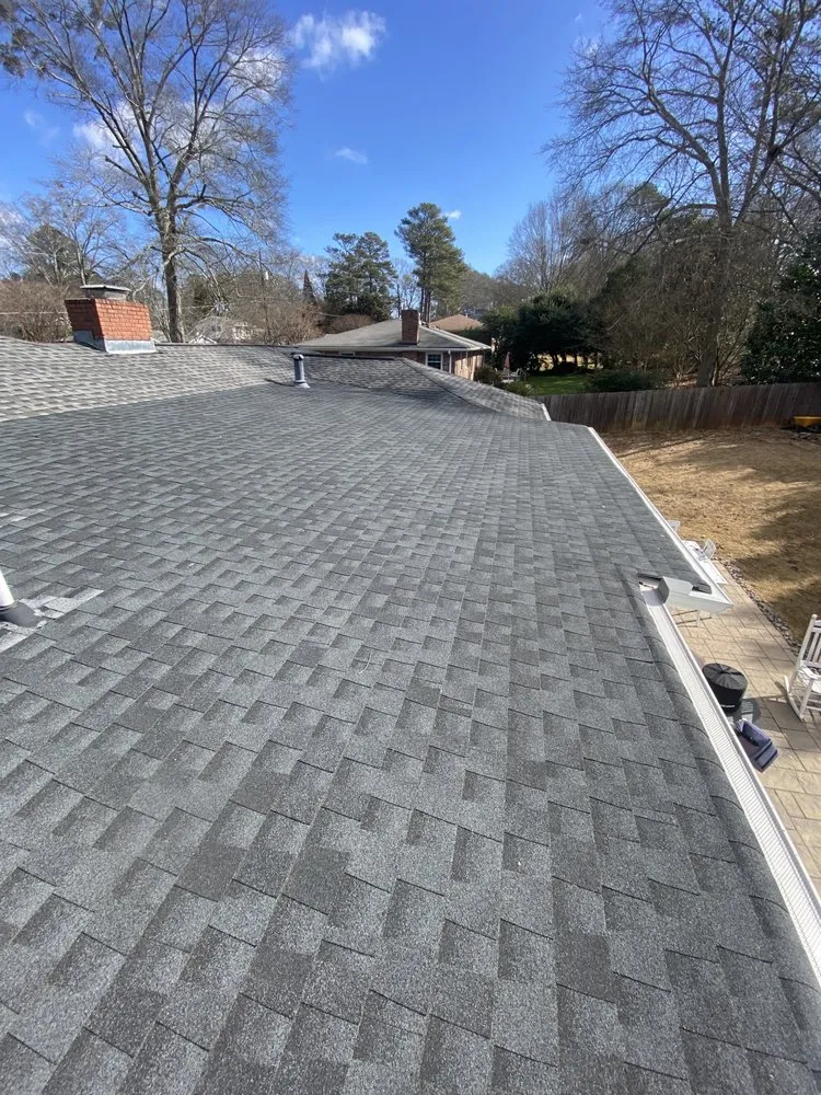 Slide of Rico’s Roofing Restorations