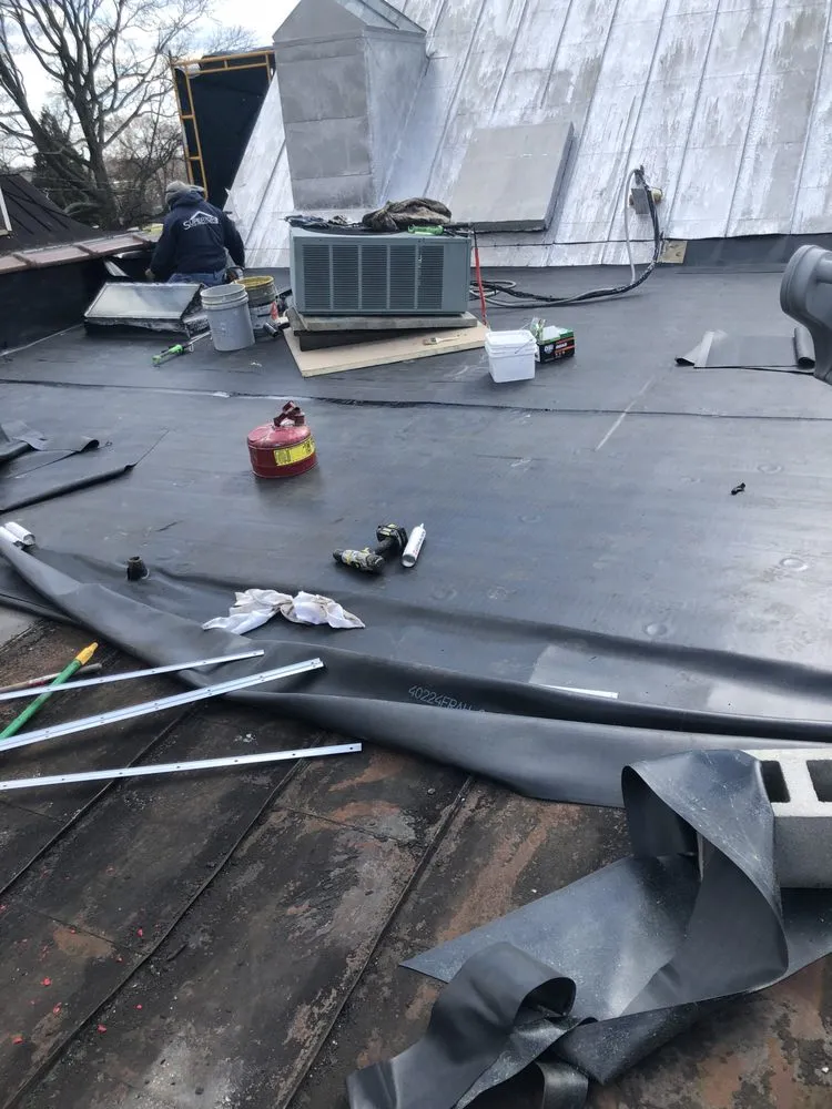 Slide of Ridge Buddy Roofing Contractor