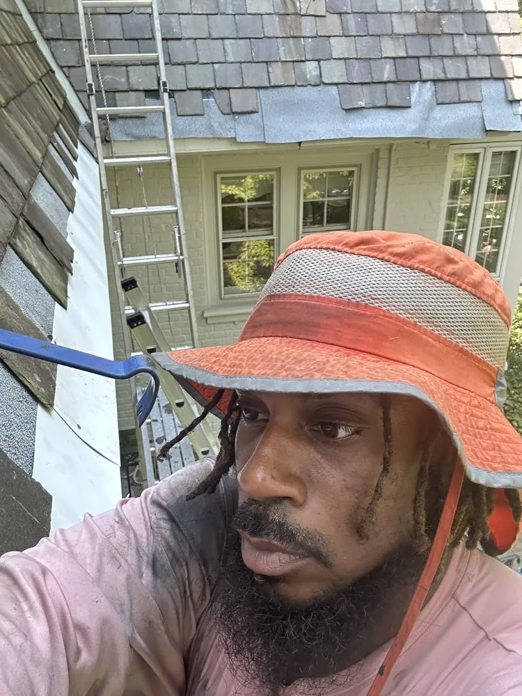 Slide of Ridge Buddy Roofing Contractor