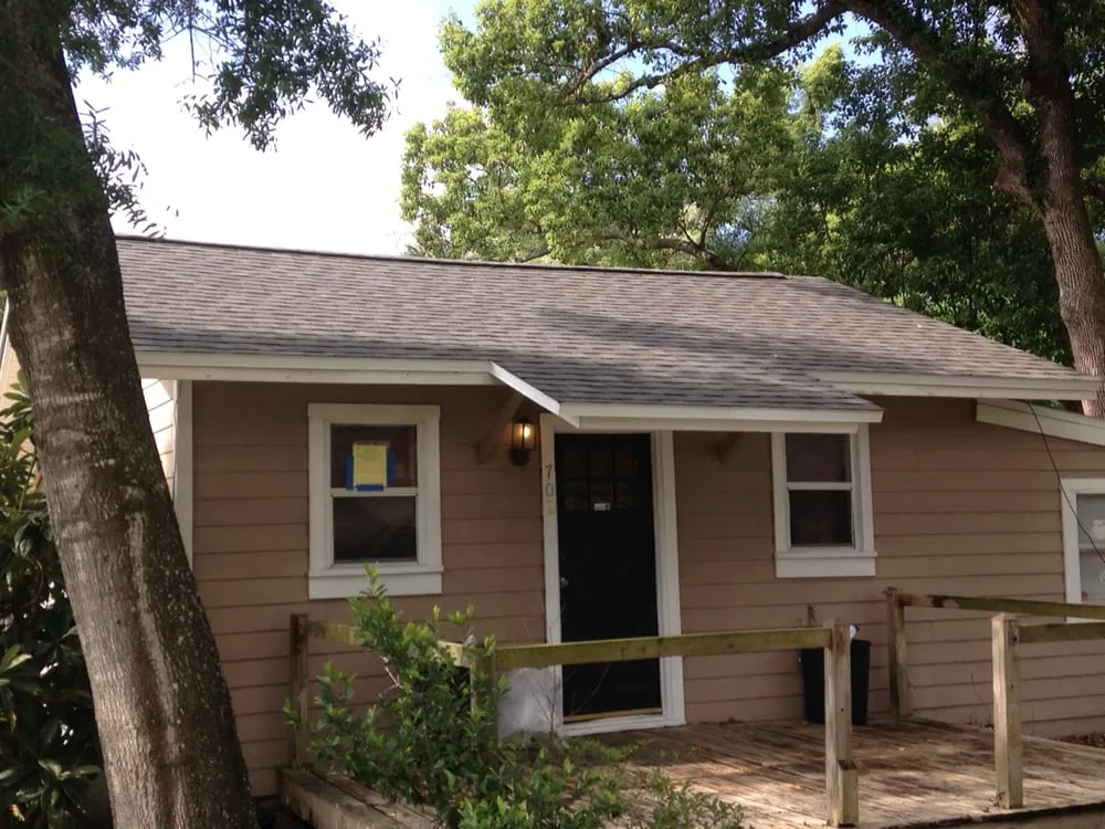 Slide of Ridge Masters Roofing