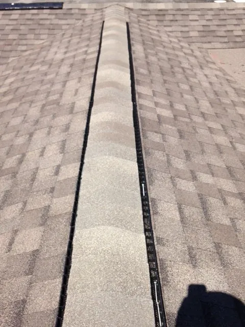 Slide of Ridge Masters Roofing