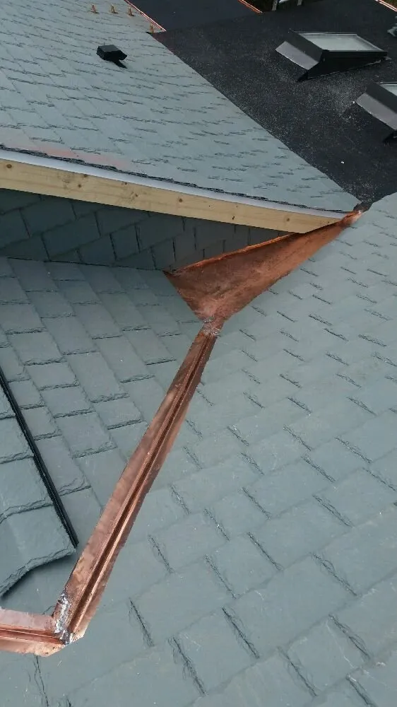 Slide of Ridged Roofing Contractors