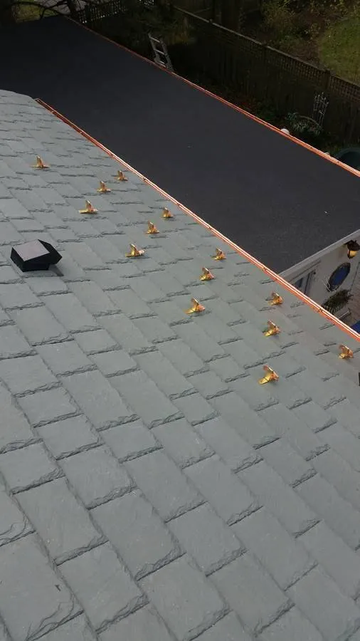 Slide of Ridged Roofing Contractors