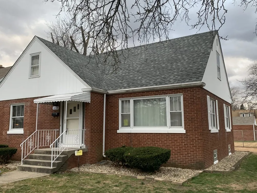 Licensed storm damage roof repair for residential properties in Summit-Argo, IL by Ridgeline Roofing