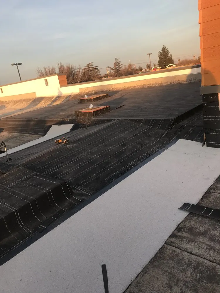 Slide of RidgeValley Roofing