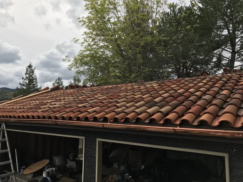 Slide of RidgeValley Roofing