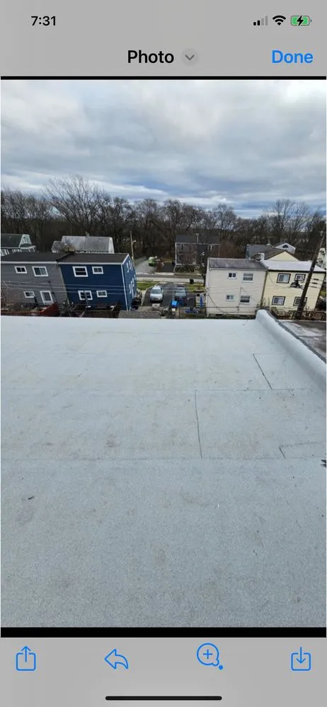 Slide of Ridley Roofing