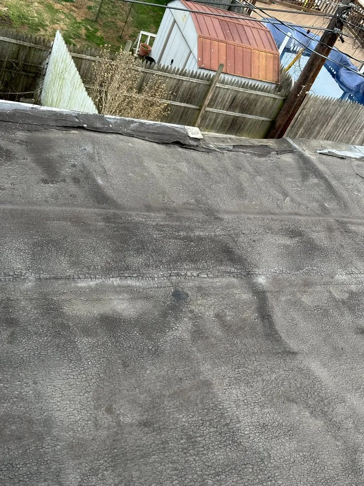 Slide of Ridley Roofing