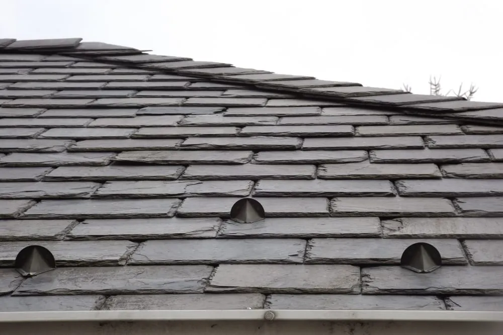 Slide of Riedel Roofing