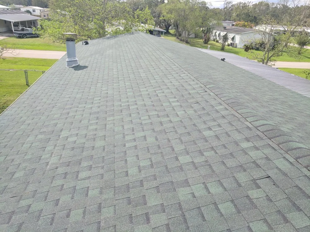 Slide of RIG Roofing